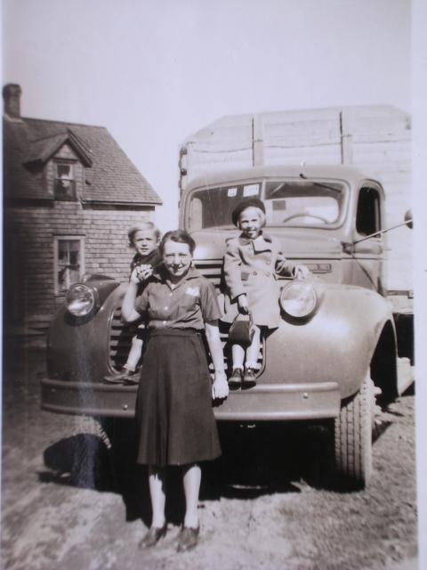 Bella (Landry) Vienneau with two of her children