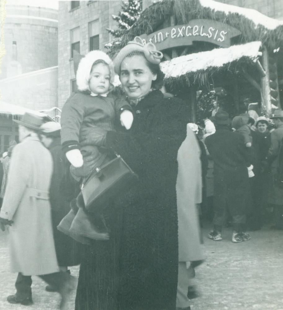 Evangeline (Vienneau) Côté holding daughter