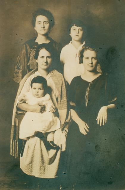 Regina (back left) with sisters, niece,  & cousin