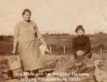 Ida & daug. Ramona White digging potatoes 1923